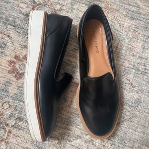 Slight platform black, white and tan loafers